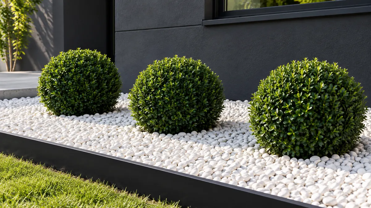 White pea gravel in a modern garden bed